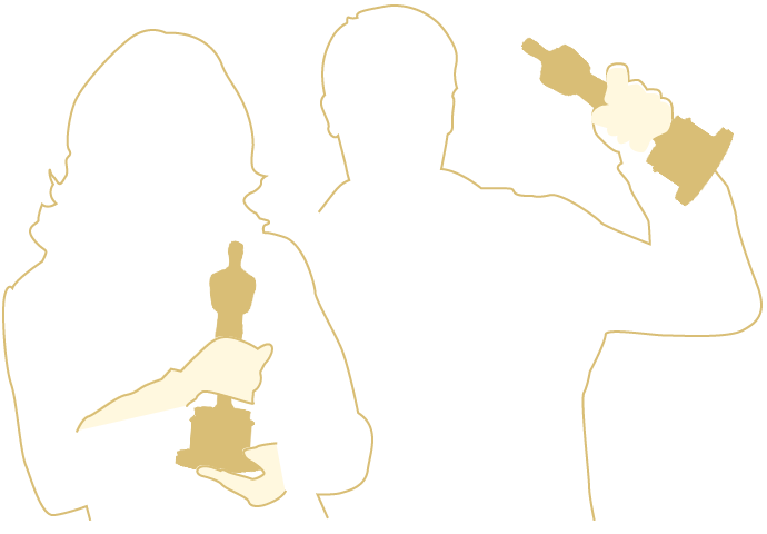 woman clutching statuette and man hoisting it